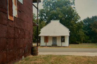 William Christenberry (1936-2016); Warehouse Wall and Store, Newbern, Alabama;