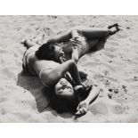 Leon Levinstein (1910-1988); Untitled [two girls lying on the beach, Coney Island, Brooklyn];