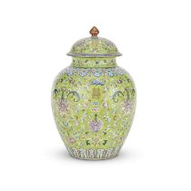 A FAMILLE ROSE LIME GREEN-GROUND 'LOTUS SCROLL' OVOID JAR AND COVER Daoguang seal mark and of th...