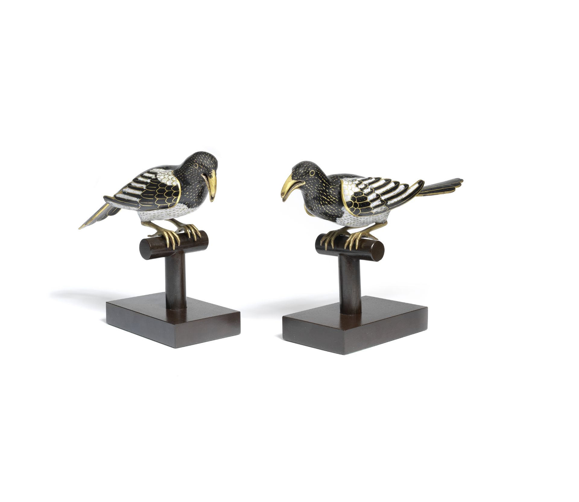 A RARE PAIR OF CLOISONN&#201; ENAMEL MAGPIES ON STANDS 17th/18th century (2)