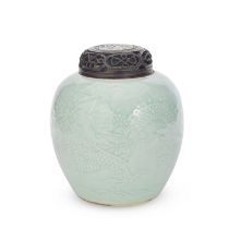 A CARVED CELADON-GLAZED 'DRAGON' JAR Qing Dynasty