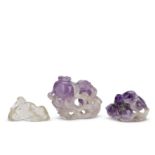 TWO CARVED AMETHYST 'FRUIT' CARVINGS AND A ROCK CRYSTAL 'LI BAI' CARVING 19th century (3)