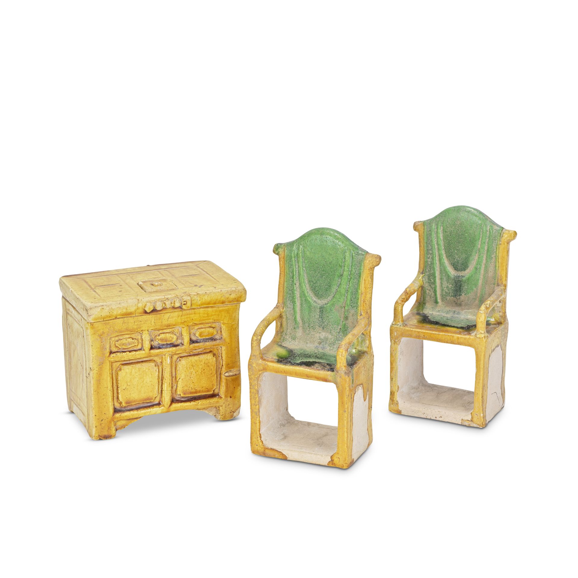 A PAIR OF GREEN AND OCHRE-GLAZED CHAIRS AND AN OCHRE-GLAZED CABINET Ming Dynasty (4)