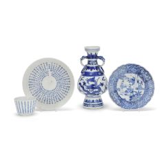 A BLUE AND WHITE 'RED CLIFF' 'CALLIGRAPHY' CUP AND A SAUCER, A BLUE AND WHITE 'DRAGON AND PHOENI...