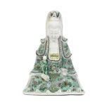 A FAMILLE VERTE BISCUIT SEATED 'GUANYIN AND CHILD' GROUP Kangxi