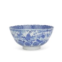 A MOULDED BLUE AND WHITE BARBED RIM BOWL Qi yu bao ding zhi zhen six-character mark, Kangxi