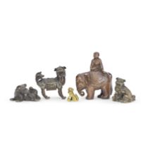 A GROUP OF BRONZE 'LION' WEIGHTS AND A BRONZE BOY AND ELEPHANT GROUP Ming to Qing Dynasty (5)