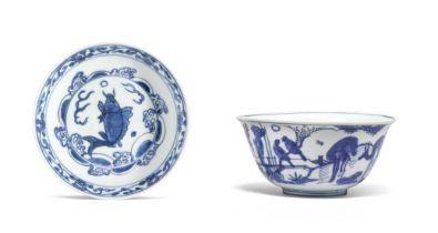 A BLUE AND WHITE 'CARP' DISH AND A BLUE AND WHITE 'MONKEY AND DEER' BOWL The bowl with a Jiajing...