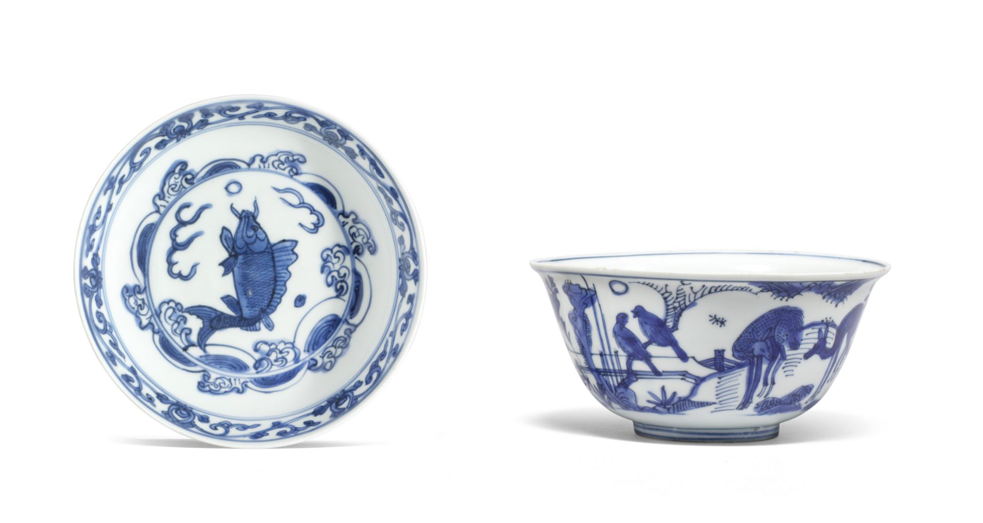 A BLUE AND WHITE 'CARP' DISH AND A BLUE AND WHITE 'MONKEY AND DEER' BOWL The bowl with a Jiajing...