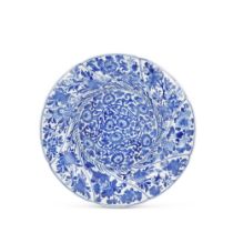 A BLUE AND WHITE SPIRAL MOULDED PLATE Kangxi