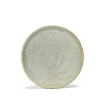 A CARVED CELADON 'FLORAL' DISH Song Dynasty