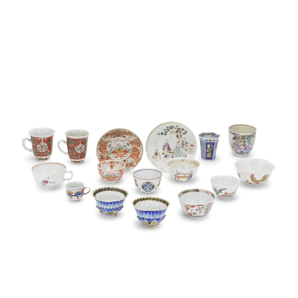 A COLLECTION OF FOURTEEN CHINESE AND JAPANESE CUPS AND TWO SAUCERS 17th/18th century (16)