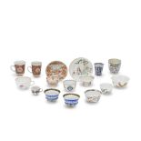 A COLLECTION OF FOURTEEN CHINESE AND JAPANESE CUPS AND TWO SAUCERS 17th/18th century (16)