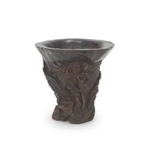A CARVED ALOESWOOD 'LANDSCAPE' LIBATION CUP 17th/18th century