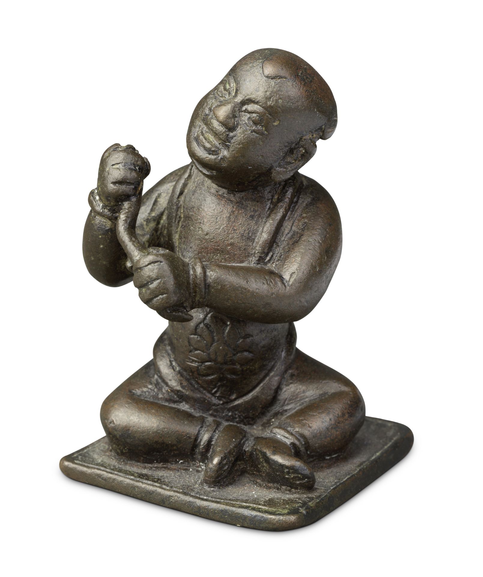A BRONZE 'BOY AND LOTUS' SCROLL WEIGHT Yuan/Ming Dynasty