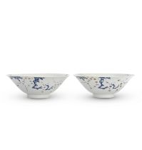 A PAIR OF UNDERGLAZE BLUE, COPPER RED AND WHITE SLIP DECORATED 'PRUNUS' BOWLS Chenghua six-char...