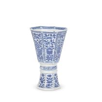 A BLUE AND WHITE OCTAGONAL STEM CUP Kangxi