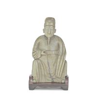 A MOTTLED PALE GREY-CELADON JADE CARVING OF A SCHOLAR 17th century (2)