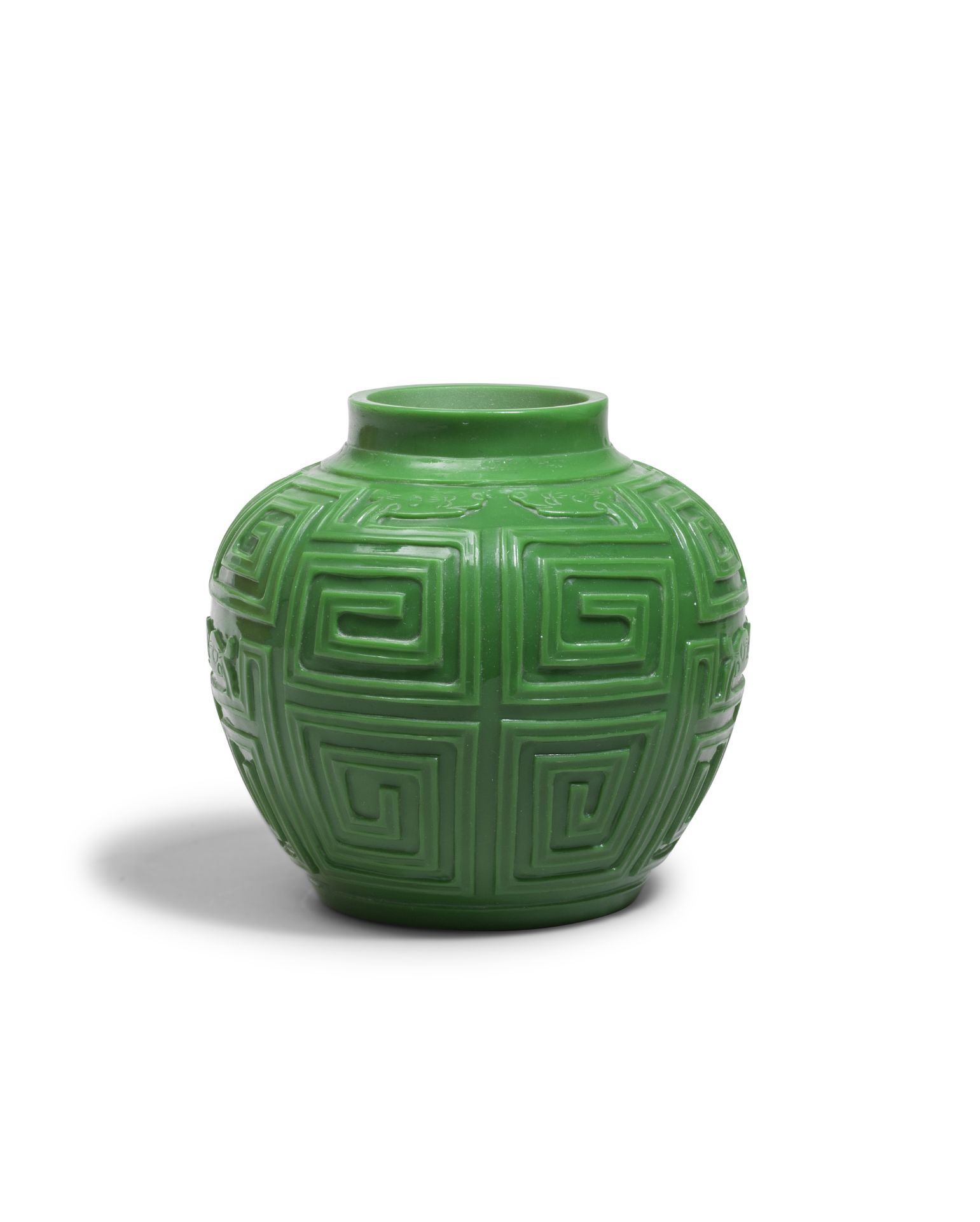 A CARVED GREEN GLASS JAR 19th century