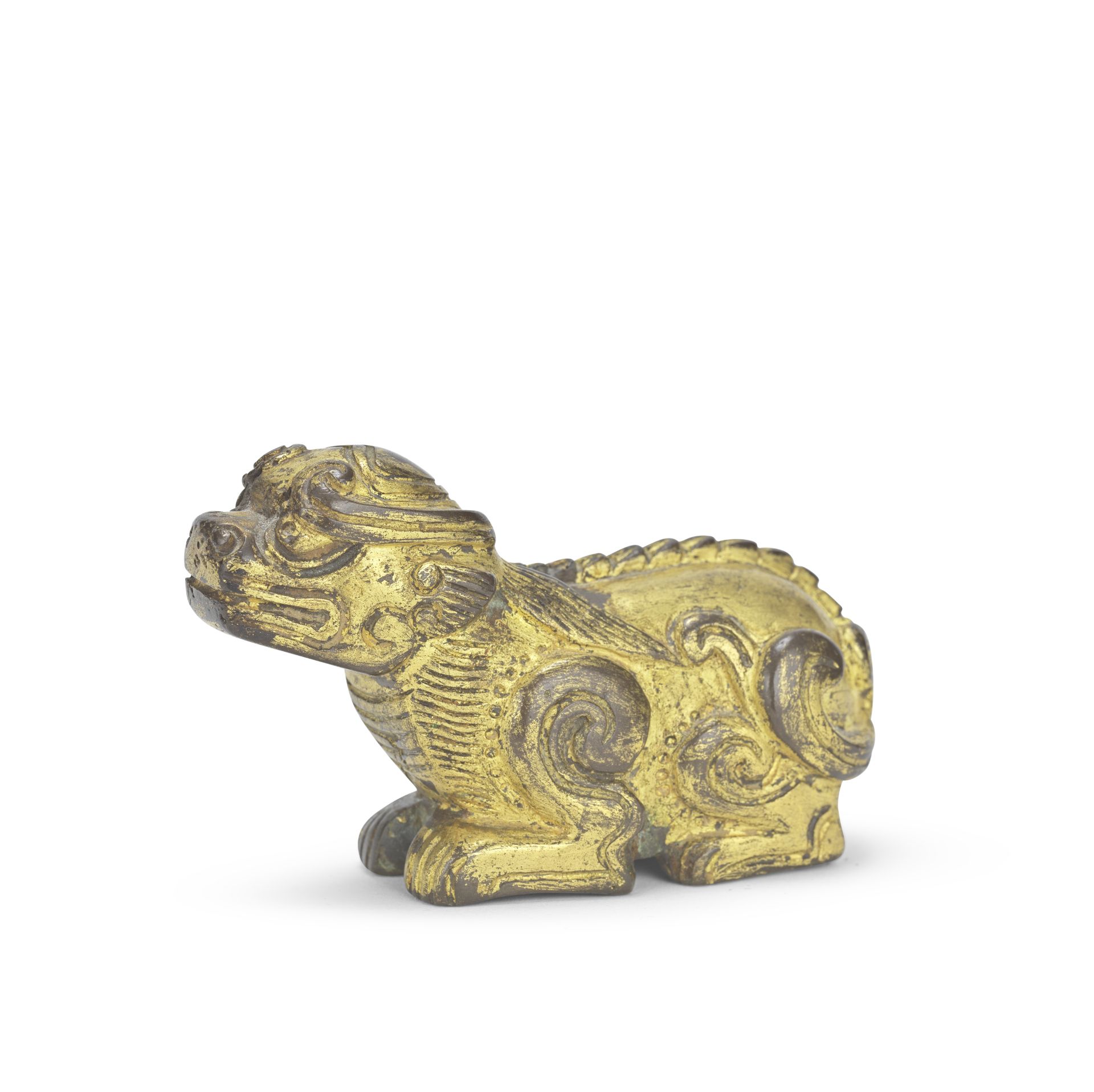 A GILT BRONZE FIGURE OF A BUDDHIST LION Ming Dynasty (2)