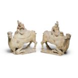 A PAIR OF PAINTED POTTERY MODELS OF CAMELS AND FOREIGN MERCHANT RIDERS Tang Dynasty (4)