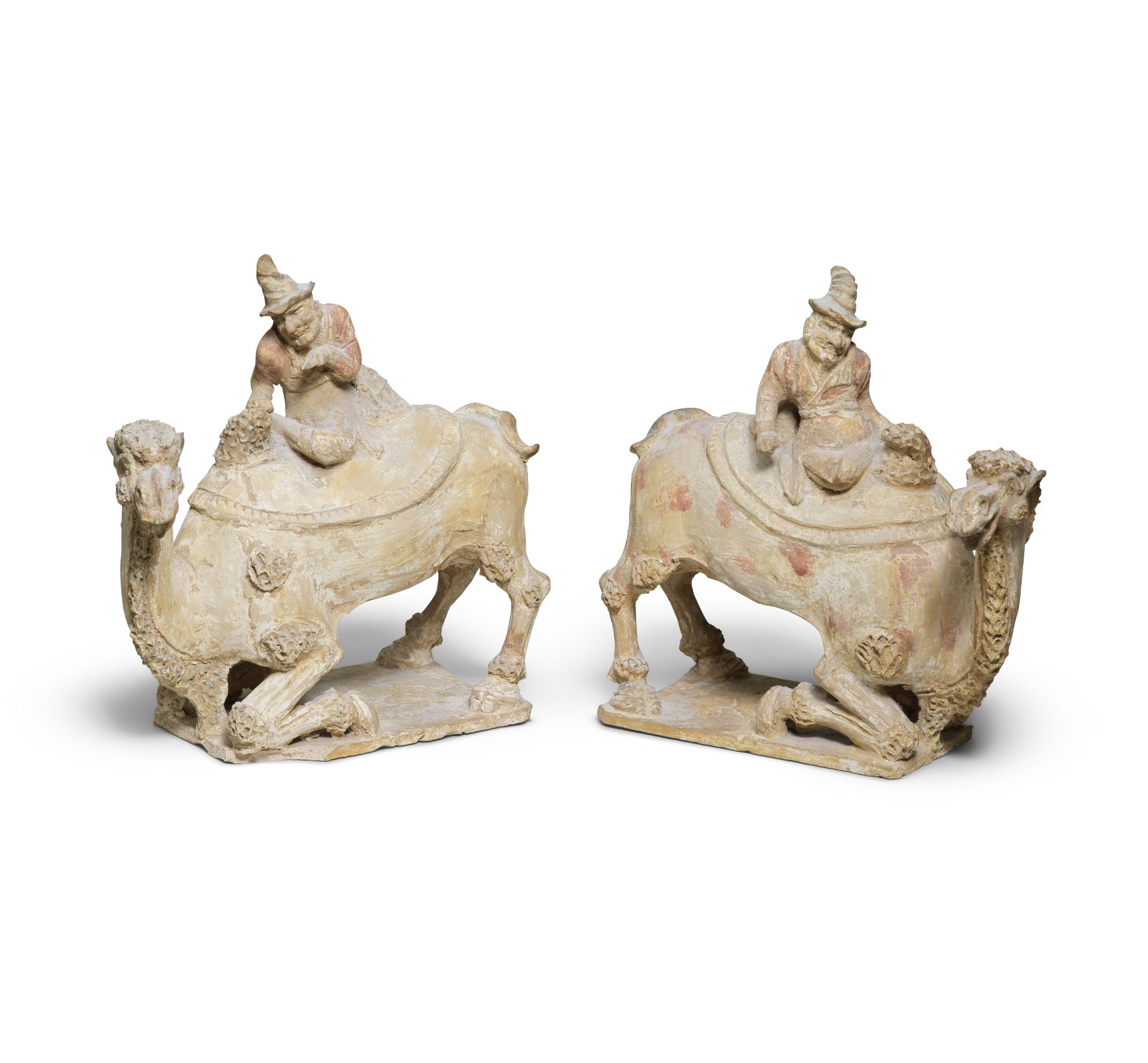 A PAIR OF PAINTED POTTERY MODELS OF CAMELS AND FOREIGN MERCHANT RIDERS Tang Dynasty (4)