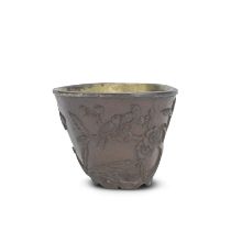 A CARVED COCONUT CUP Kangxi