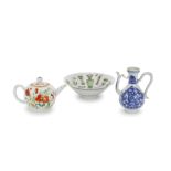 A FAMILLE VERTE 'TREASURES' BOWL, A FAMILLE VERTE TEAPOT AND COVER AND A BLUE AND WHITE EWER Kan...