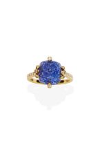 CARVED SAPPHIRE AND DIAMOND RING