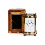 A brass cased carriage timepiece made for V. Samuel & Co of London