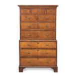A George II walnut and featherbanded chest on chest