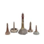 A group of five 20th century carved Cornish serpentine marble models of lighthouses (5)
