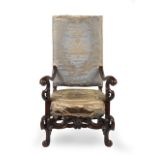 An Edwardian or early 20th century walnut armchair In the late 17th century style
