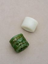 Two jade archers' rings 19th/ 20th century (2)