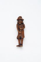 A WOOD NETSUKE OF A NANBANJIN Edo Period, early 19th Century