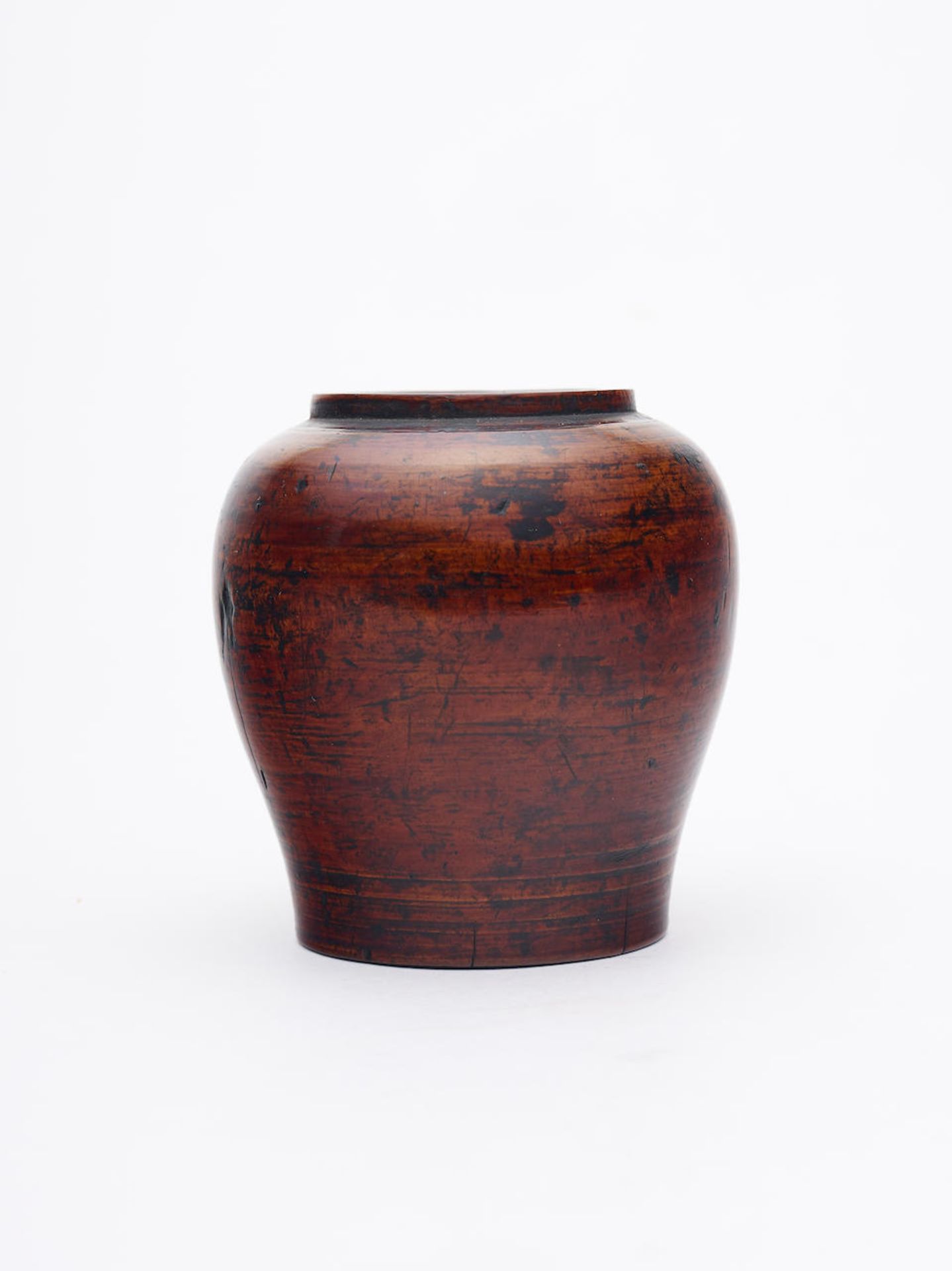 A small boxwood jar