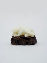 A white jade chi dragon 19th/ 20th century