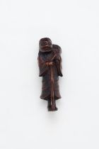 A WOOD NETSUKE OF GAMA SENNIN Edo Period, 19th Century