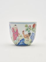A famille-rose 'boy and chicken' cup Qianlong Fanggu six-character mark, 20th century