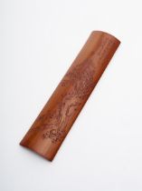 A bamboo 'landscape' wrist rest 19th/ 20th century