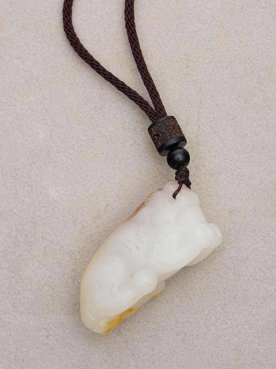 A white jade 'pixiu' toggle 20th century