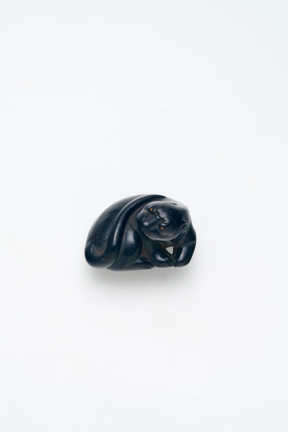 A WOODEN NETSUKE OF A TIGER Edo Period, 19th Century