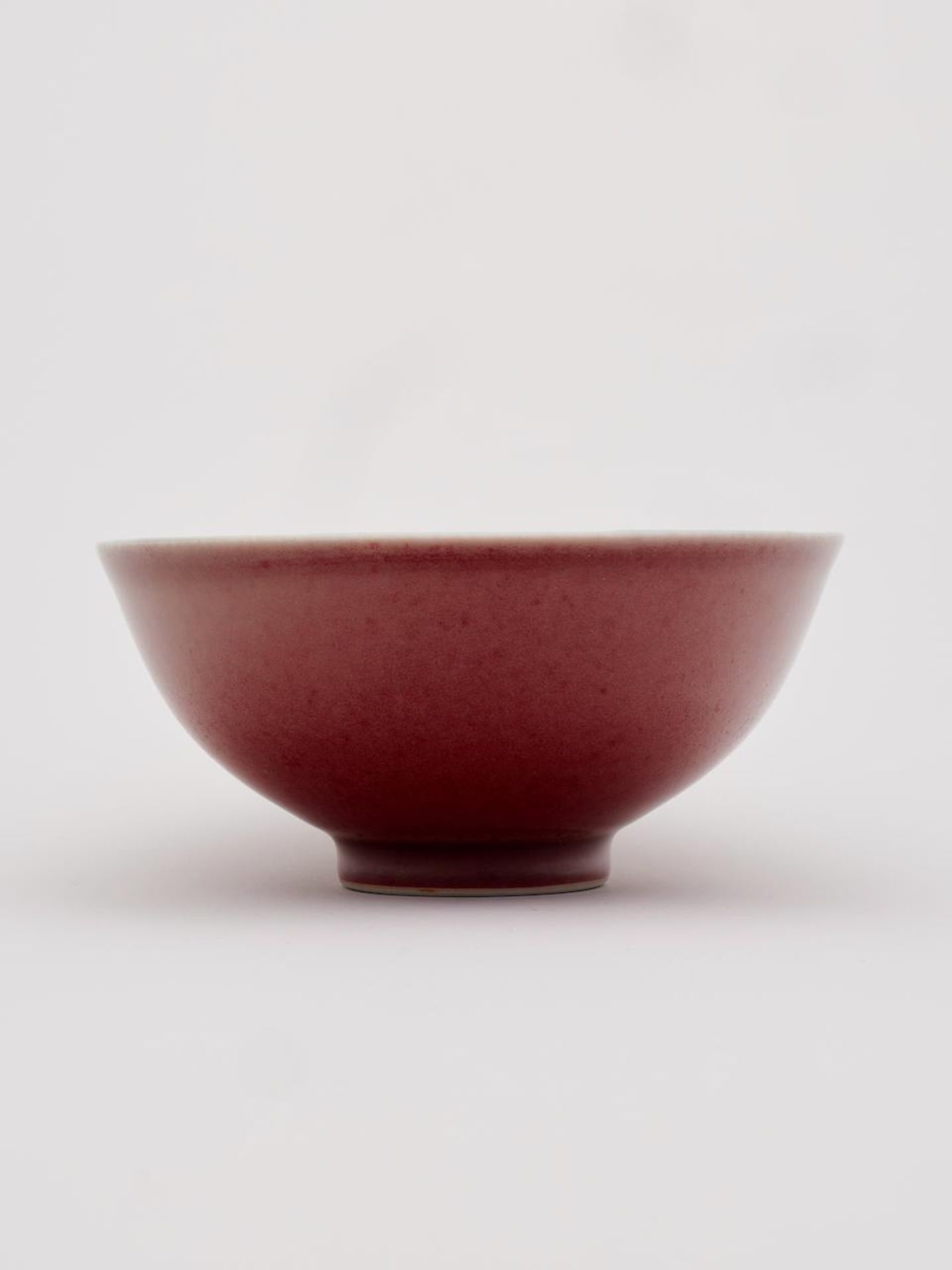 A peach-bloom glazed bowl Qianlong six-character mark, 20th century