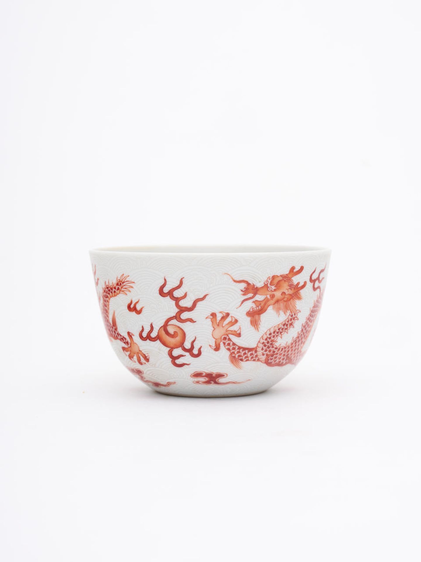An iron-red enamelled 'dragon' cup Qianlong six-character mark, 20th century