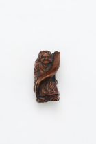 A WOOD NETSUKE OF KANZAN Edo Period, 19th Century