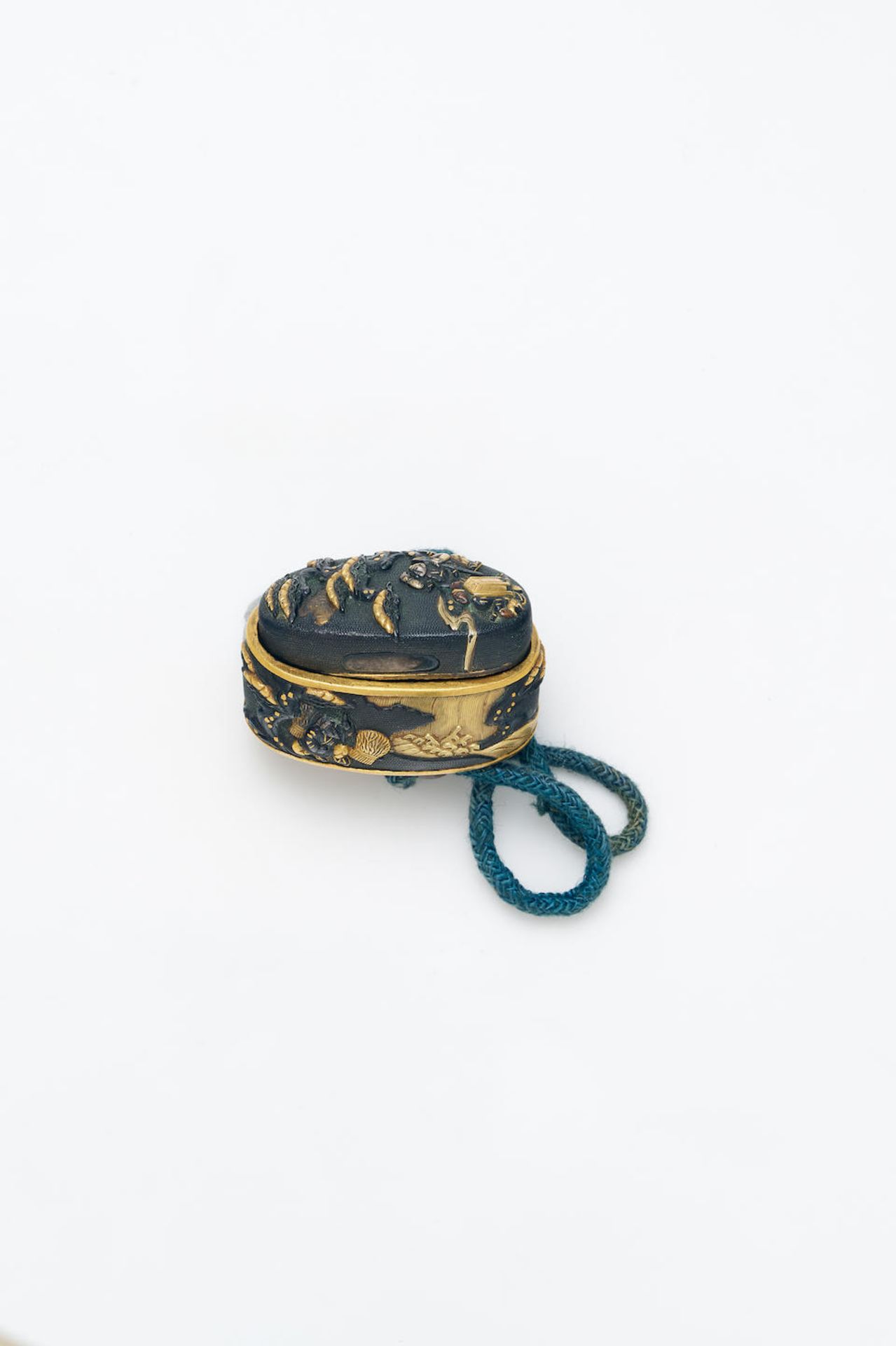 A GOLD AND MIXED-METAL INLAID FUCHIGASHIRA REPURPOSED AS A NETSUKE Edo Period, 18th/19th Century