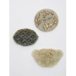 Three reticulated jade plaques 19th/ 20th century (3)