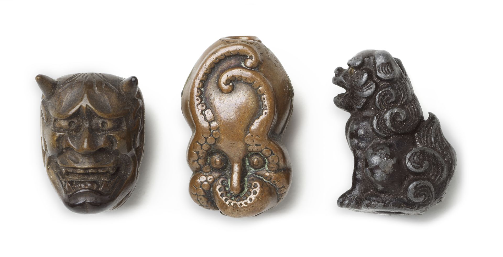 THREE OJIME OF DIFFERENT MATERIALS Meiji era (1868-1912), late 19th/early 20th century (3)