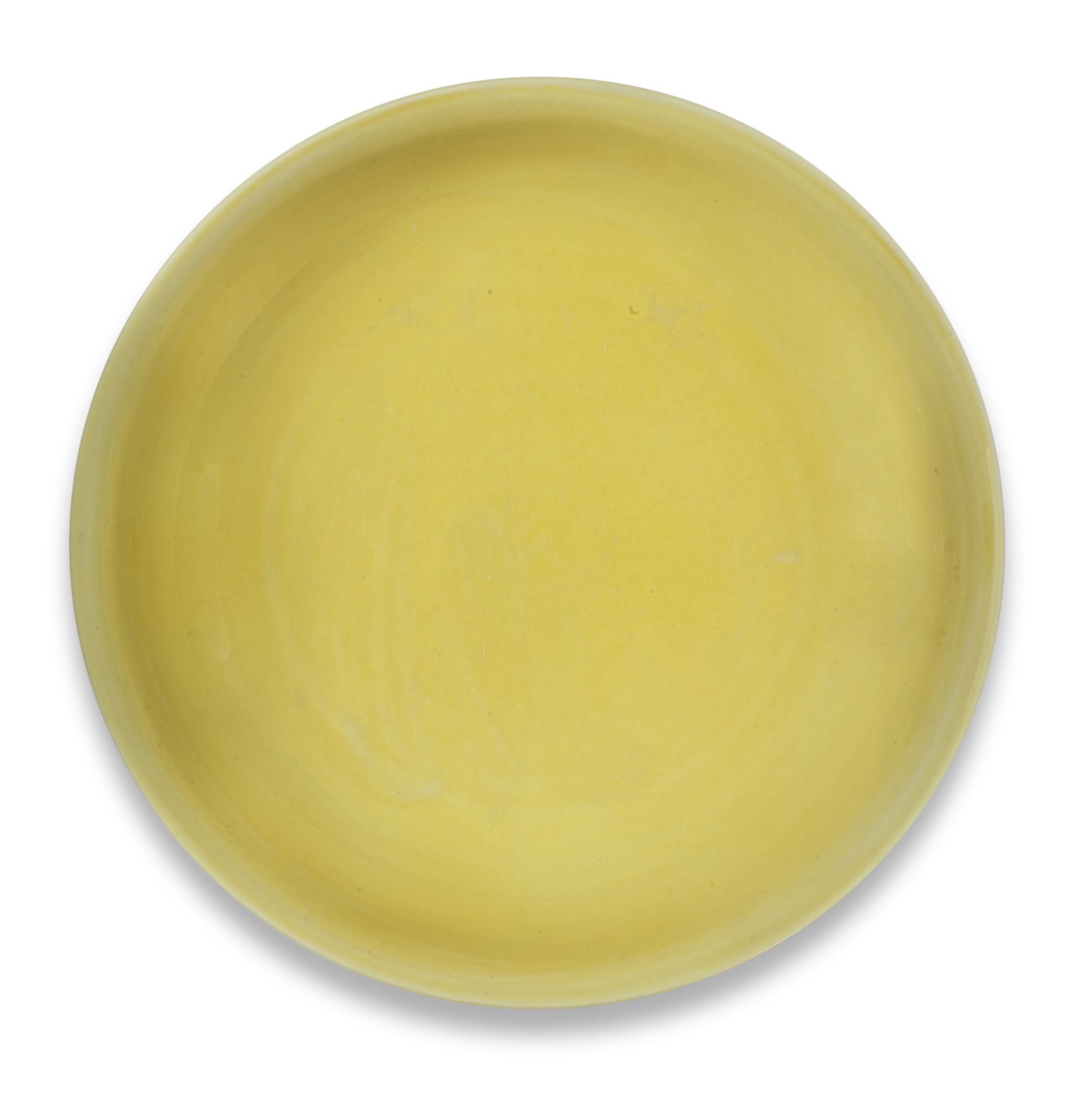 AN IMPERIAL YELLOW-GLAZED SAUCER-DISH Jiajing six-character mark and of the period