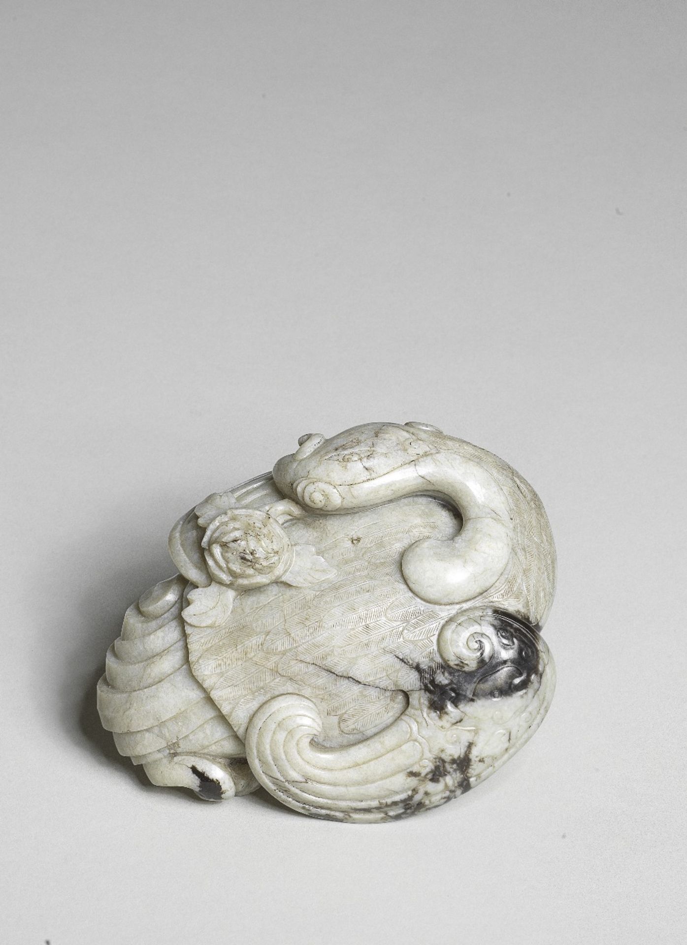 A LARGE GREY AND BLACK JADE 'PHOENIX AND PEONY' GROUP 17th/18th century